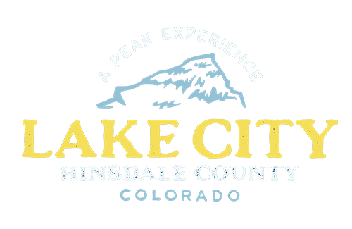Logo for Lake City, Hinsdale County, Colorado, featuring a mountain silhouette and the slogan "A Peak Experience" above the text.