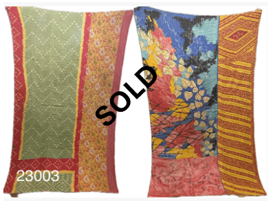 Two vibrant, patterned Kantha Quilt pieces side by side, labeled "23003" on the left. A "SOLD" stamp overlays both items.