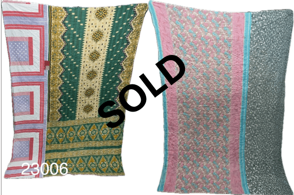 Two vibrant Kantha Quilts with intricate patterns are displayed side by side against a white background. The word "SOLD" is prominently overlaid on the image in bold black text. The number "23006" is visible in the lower left corner.