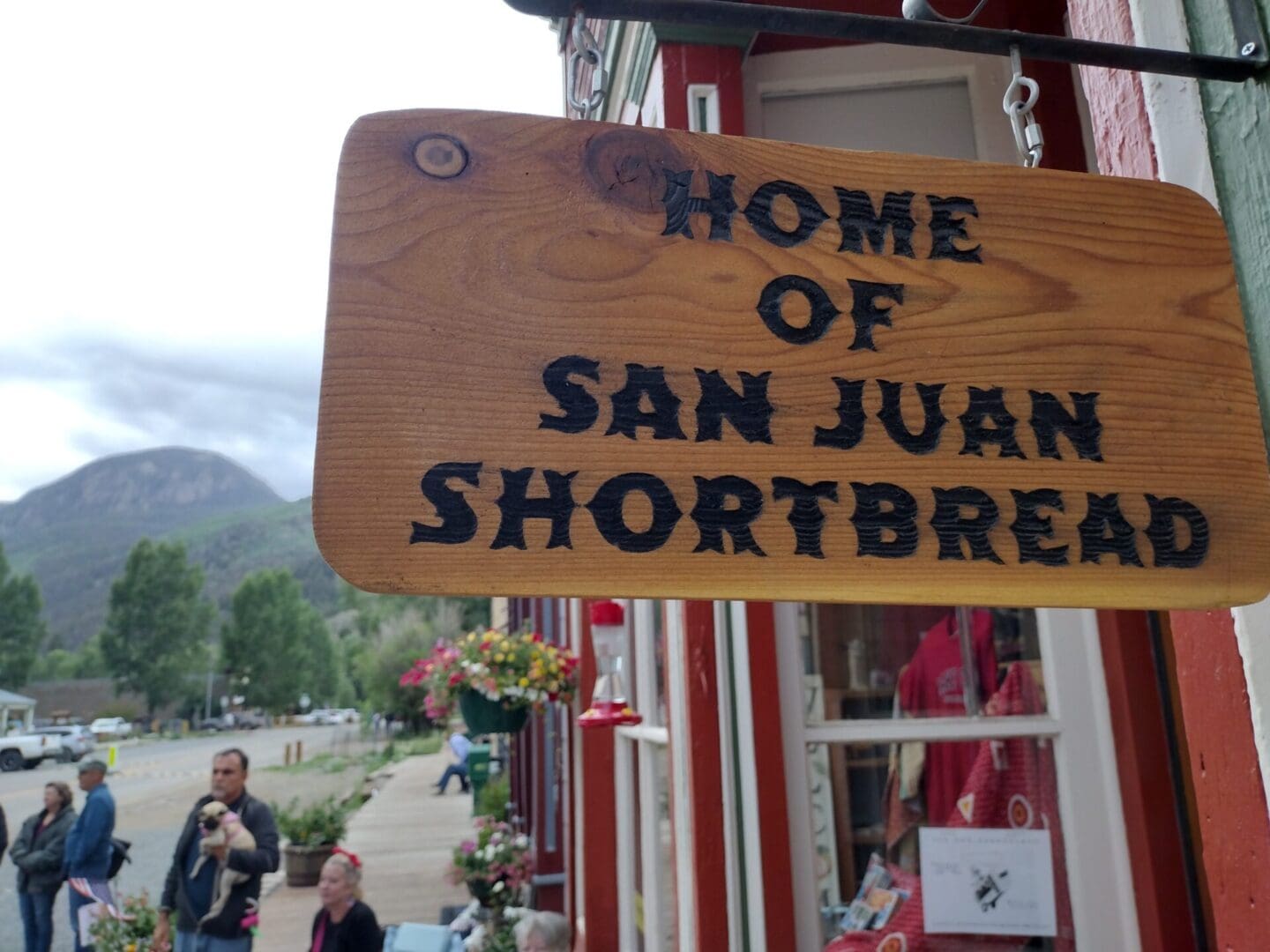 A sign that says home of san juan shortbread.